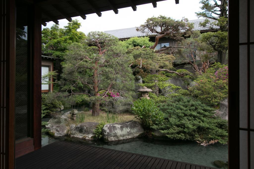 Beautiful Japanese Garden Kagetsu Hotel Fuefuki Exterior photo